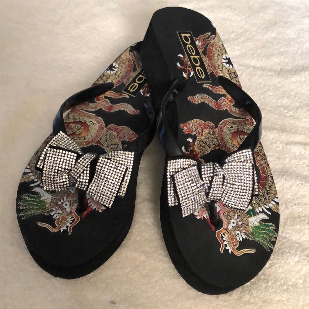 Bebe slip on sandals with rhinestone bow